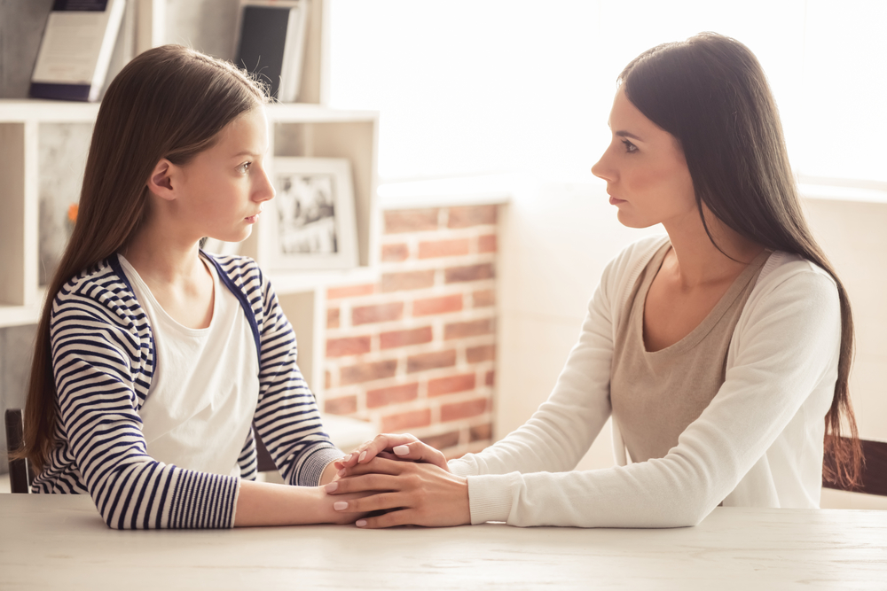 mom and daughter talking